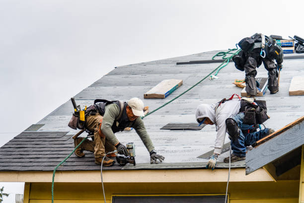 Professional Gutter Installation technician working in Manchester Center, VT
